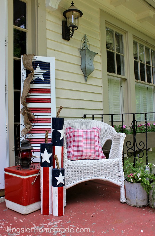 Celebrate Independance Day with these Patriotic Porch Decor Ideas flags diy budget shutter tissue paper firecrackers flowers pillows plants accessories party bbq get together patriotic july 4th1