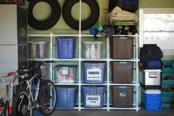 Oraganize Your Garage With These Simple Ideas and Storage Solutions shelves storage tidy organization7