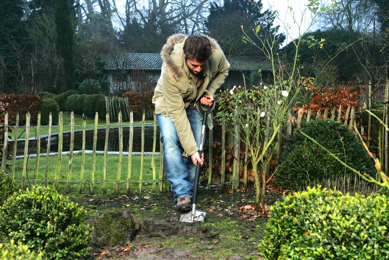 It's Time to Prep Your Garden for Next Year - Here's How soil soil testing spade weeds organic matter1