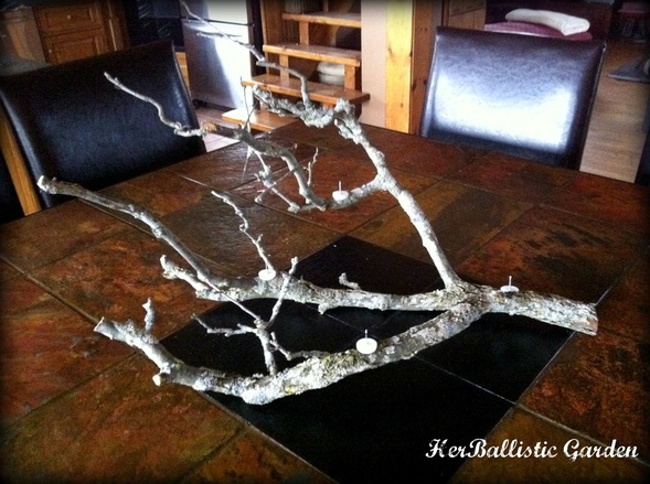 Make This Branch Candle Centerpiece For Christmas This Year glue candles decor holidays easy diy5