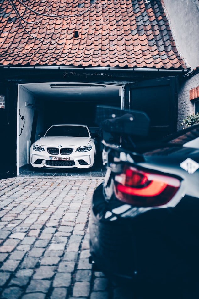 The Benefits of Installing Smart Garage Doors To Protect Your Car