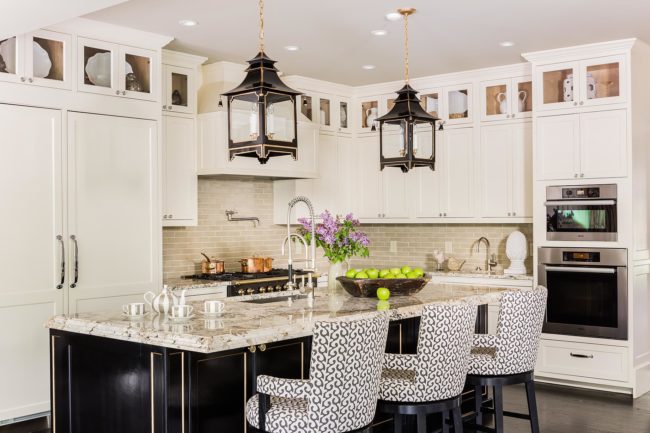 Kitchen with subway tile backsplash and kitchen island.