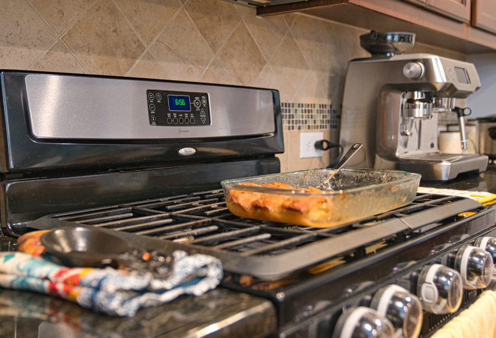 Cleaning a burn stove top.